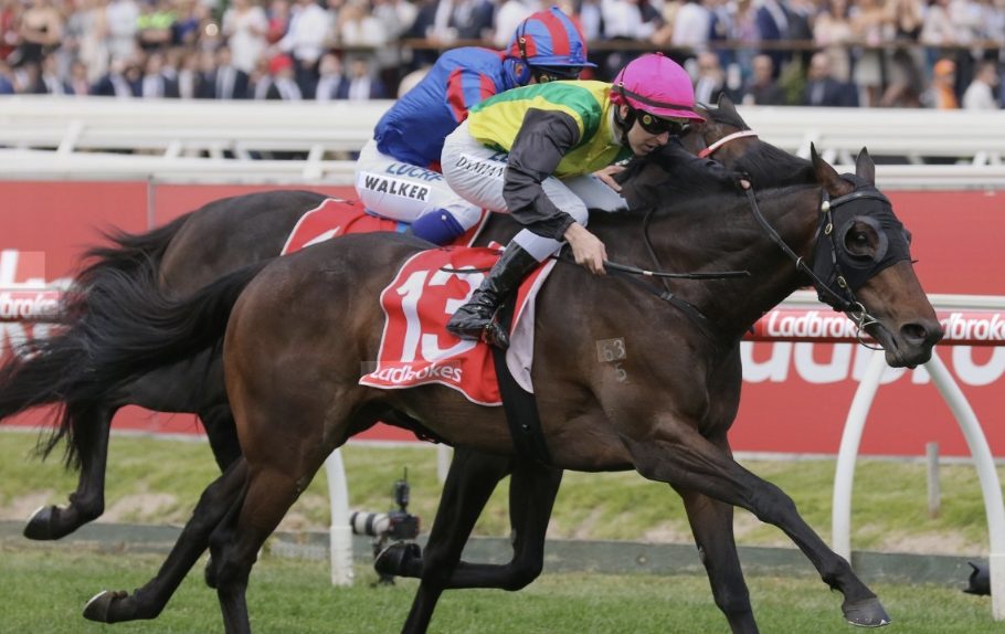 A close finish between runners at a Melbourne track